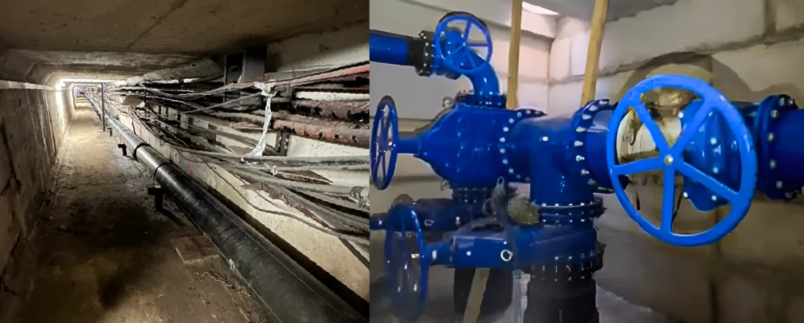 Vandentiekio tinklų diukerio projektas Kaune: kairėje matomas inžinerinių tinklų tunelis su vamzdynais po K. Mindaugo prospektu, dešinėje – naujai sumontuota mėlyna vandentiekio armatūra su sklendėmis.